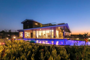 Casa del Verde by StayVista - Orchards oasis with a pool, Spacious lawn, Terrace & Indoor games